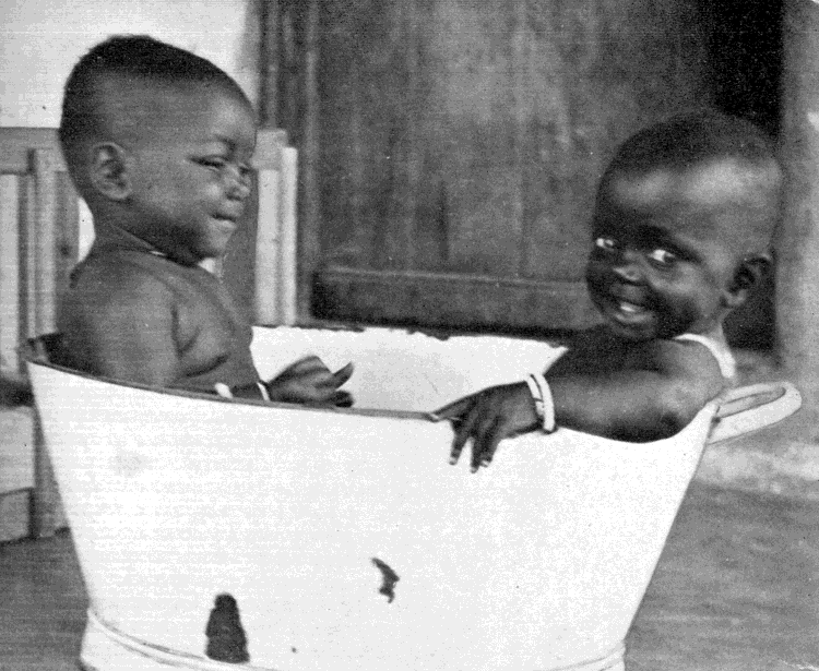 [Two babies in a tub]
