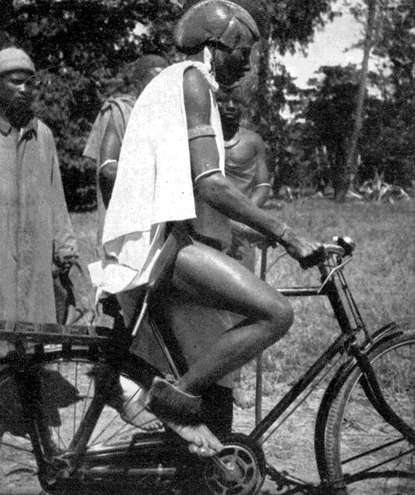 [A Masai on a bicycle]